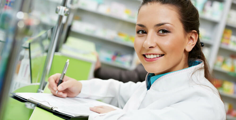 Woman Pharmacy Technician Studying Prescription Filling