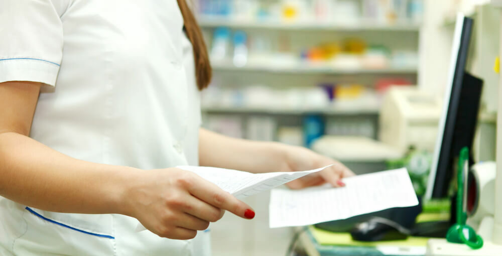Pharmacy Technician working in a retail drug store dispensing medication